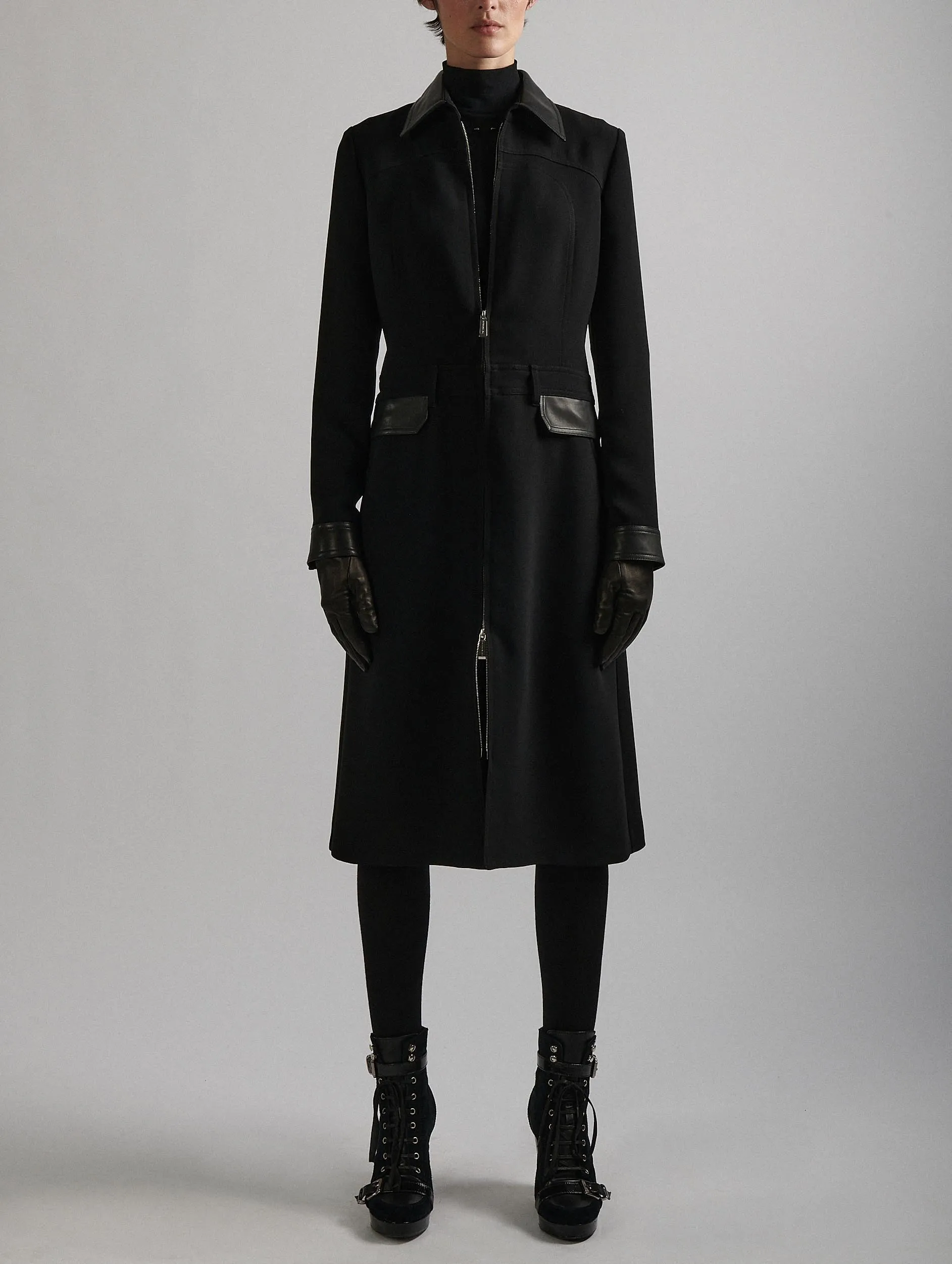 Day dress in black crepe with leather details